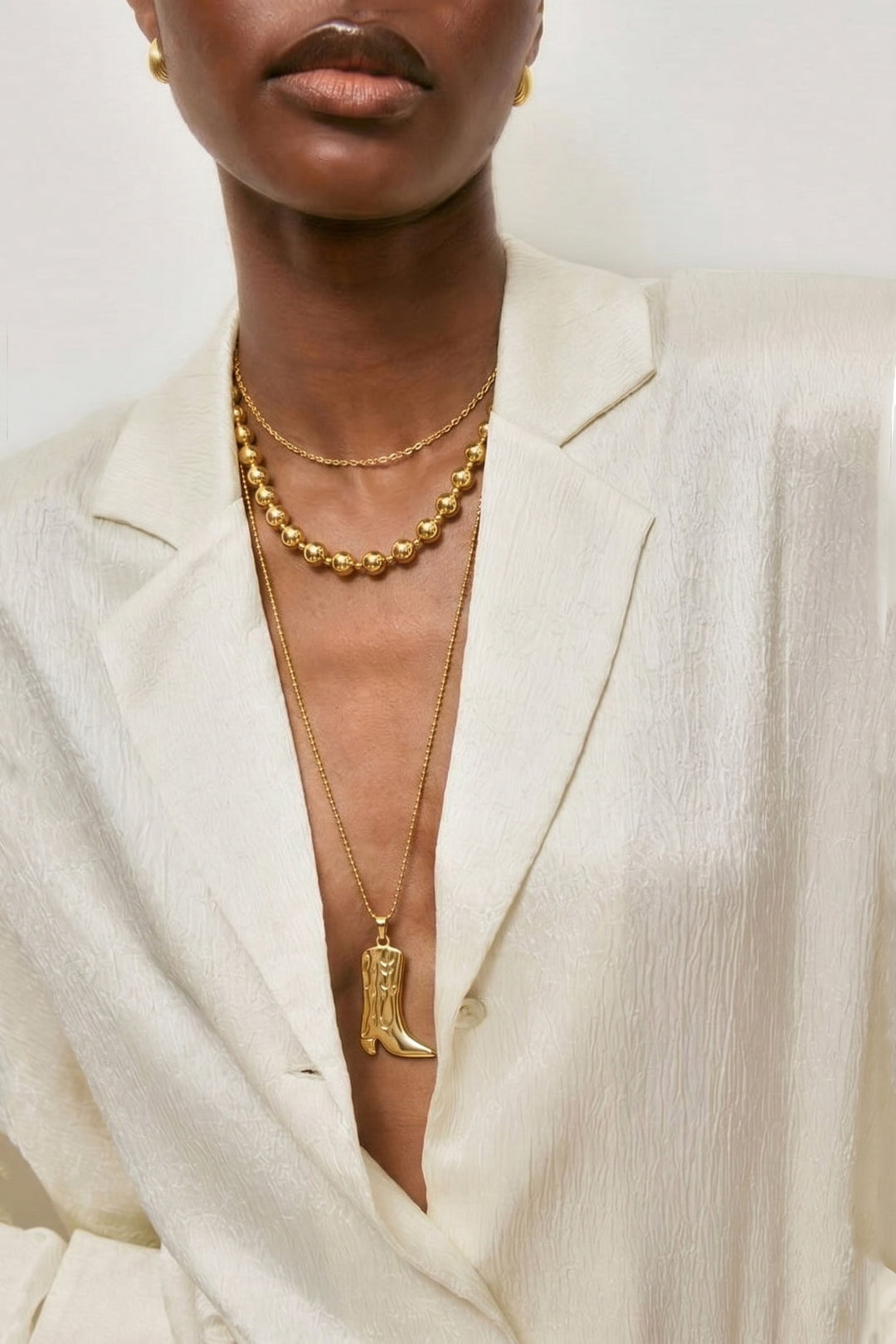 Long necklace with cowboy boot
