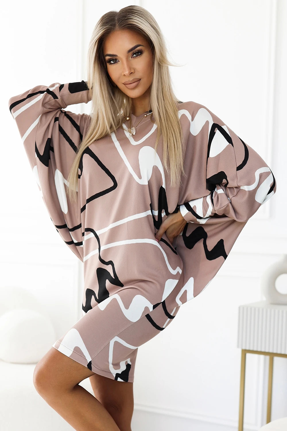 Batwing sleeveless comfortable dress with a neckline – Beige With A Black And White Pattern