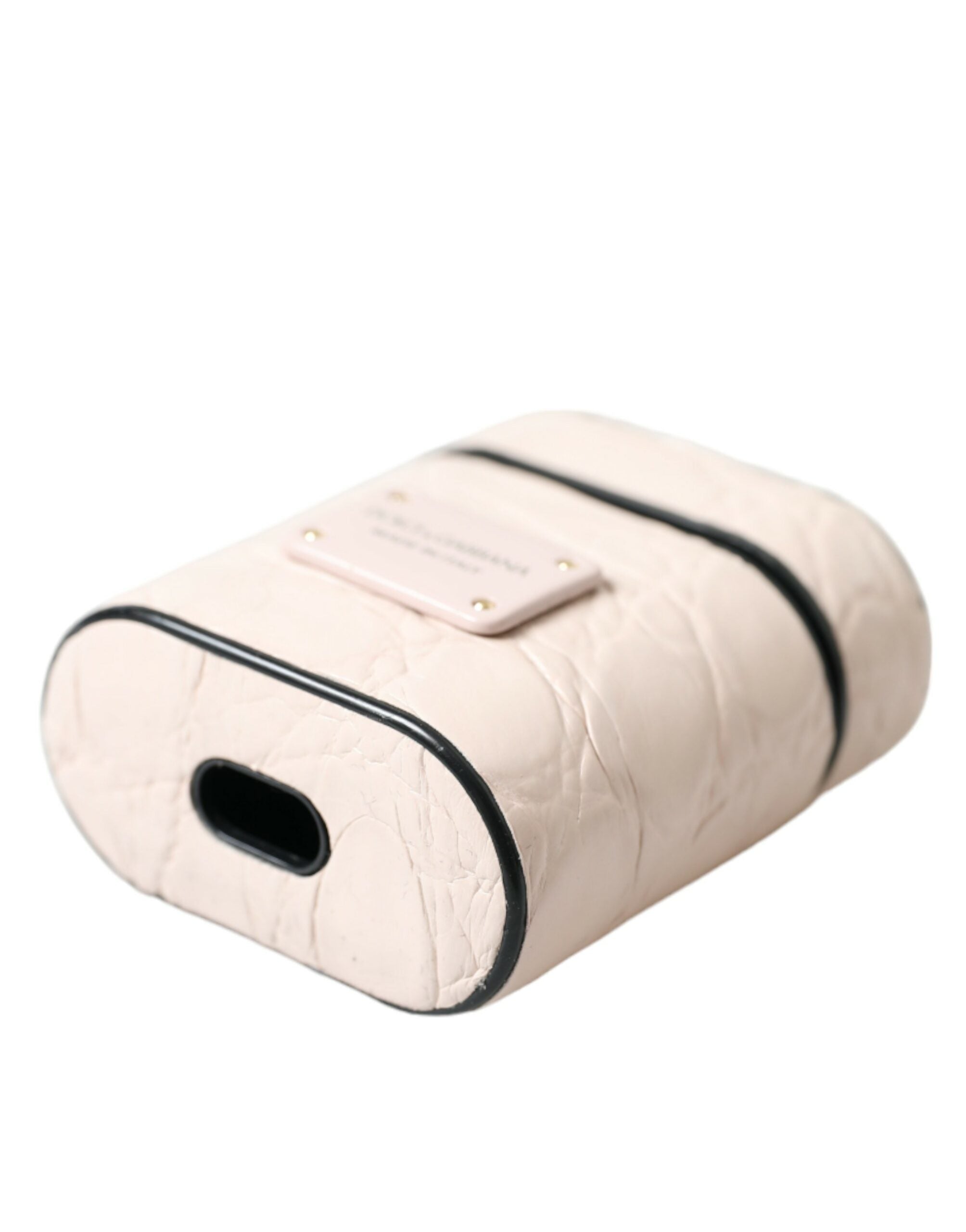 Světle růžové pouzdro na Airpods z telecí kůže s kovovým logem