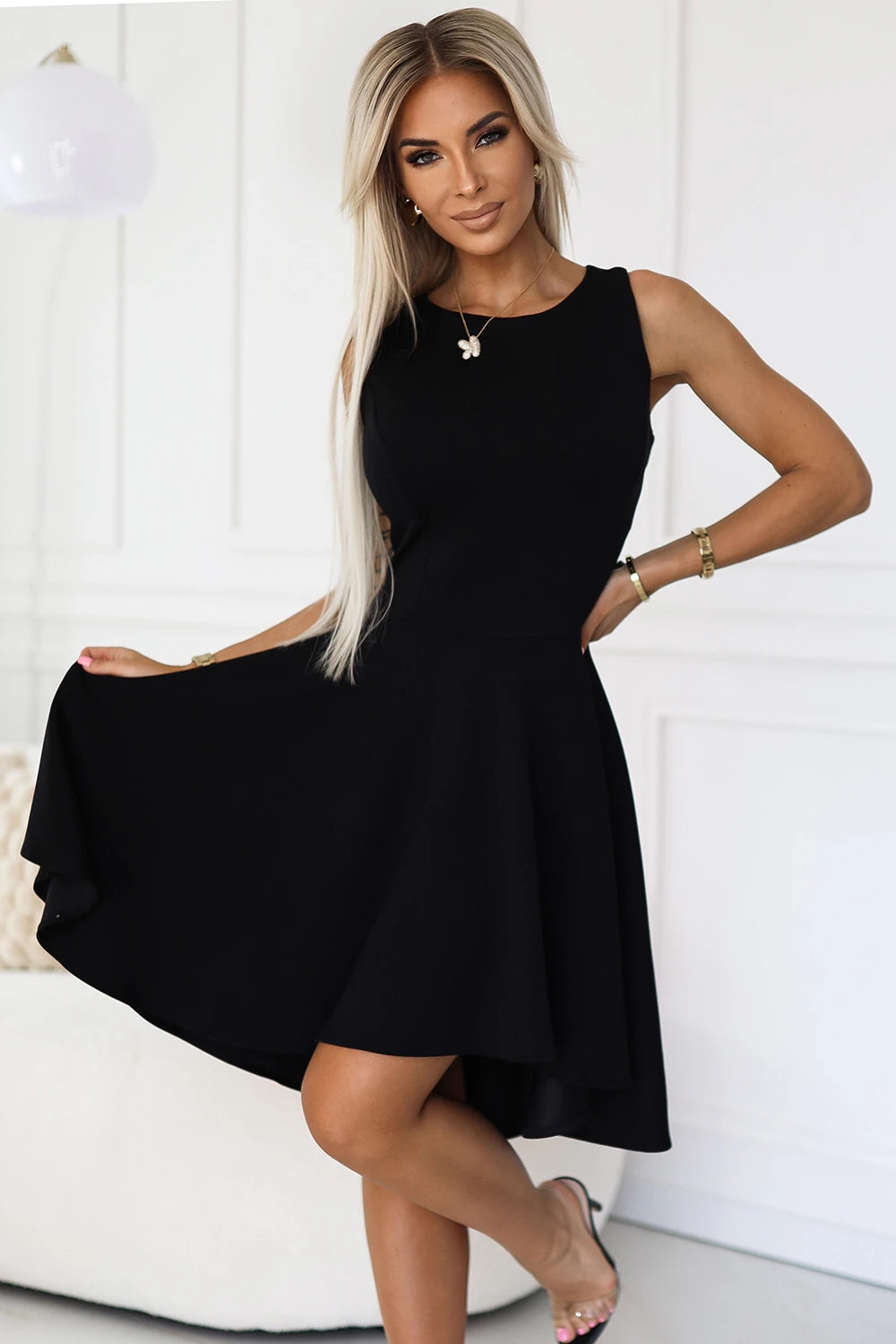 Unique dress with longer back – Black
