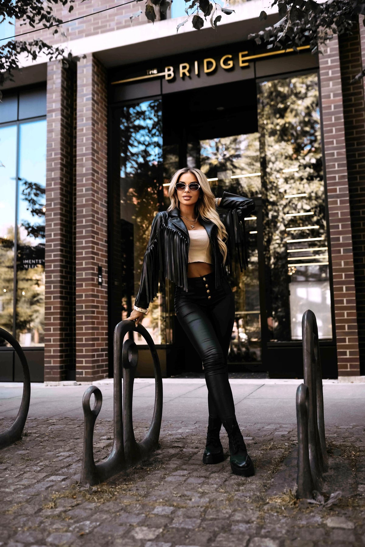 Short biker jacket with fringes made of soft eco leather – Black