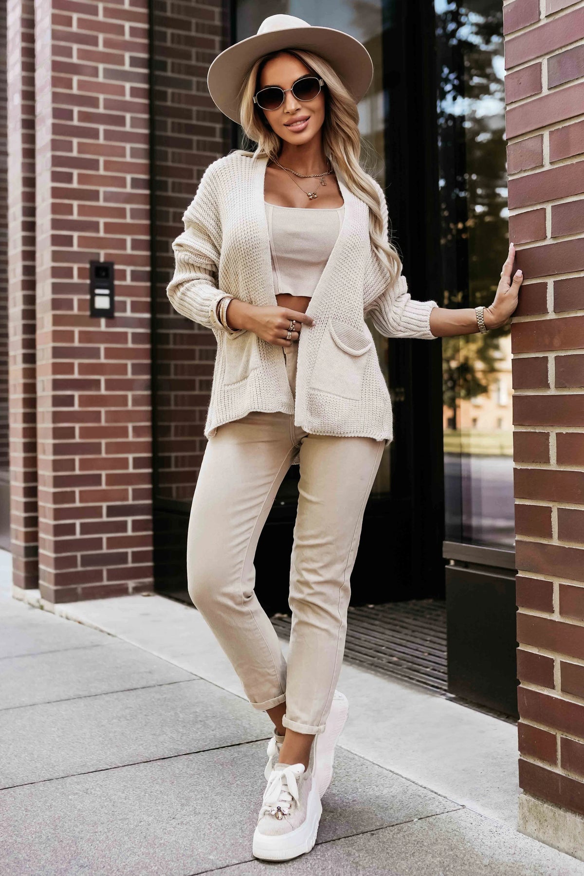 Warm cardigan with pockets and cuffs on the sleeves – Beige