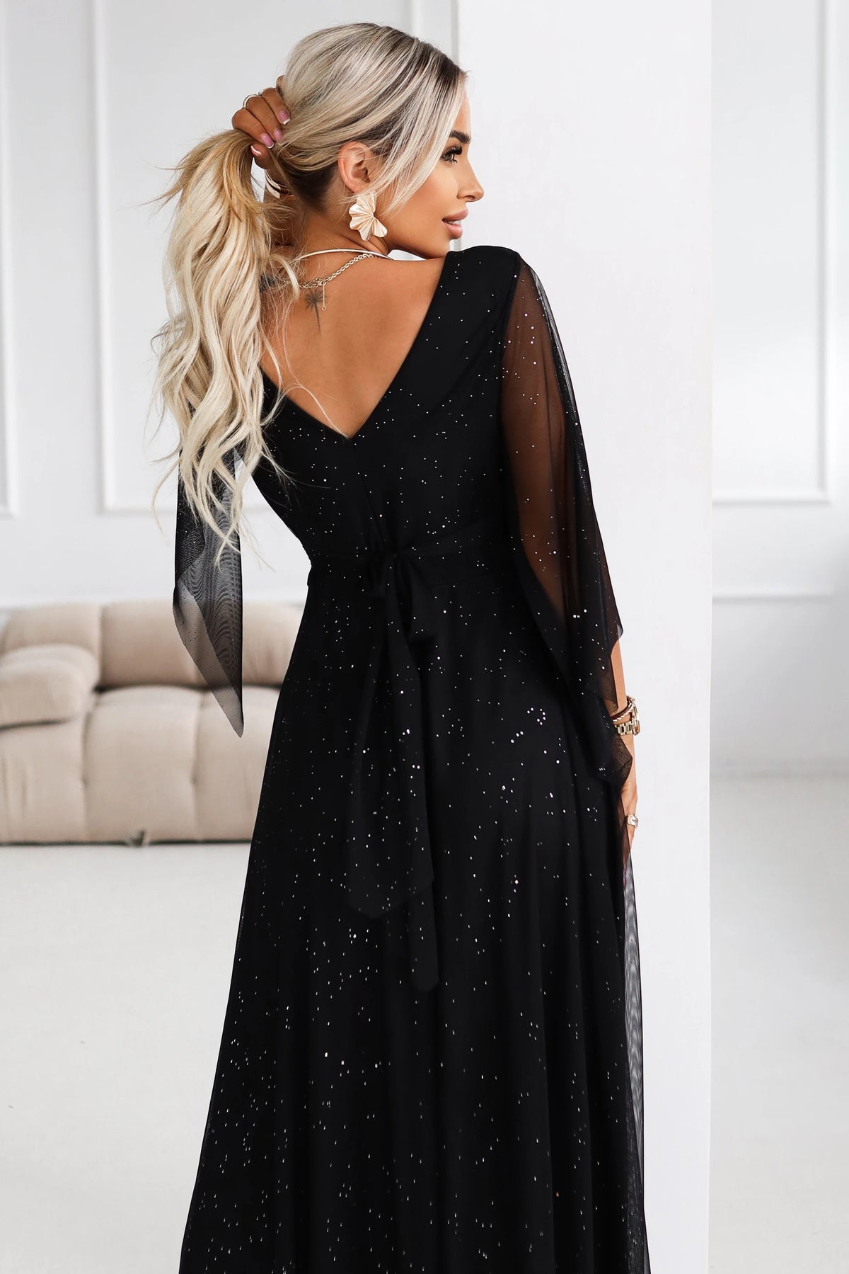 Long, shimmering dress with a neckline and transparent sleeves – Black