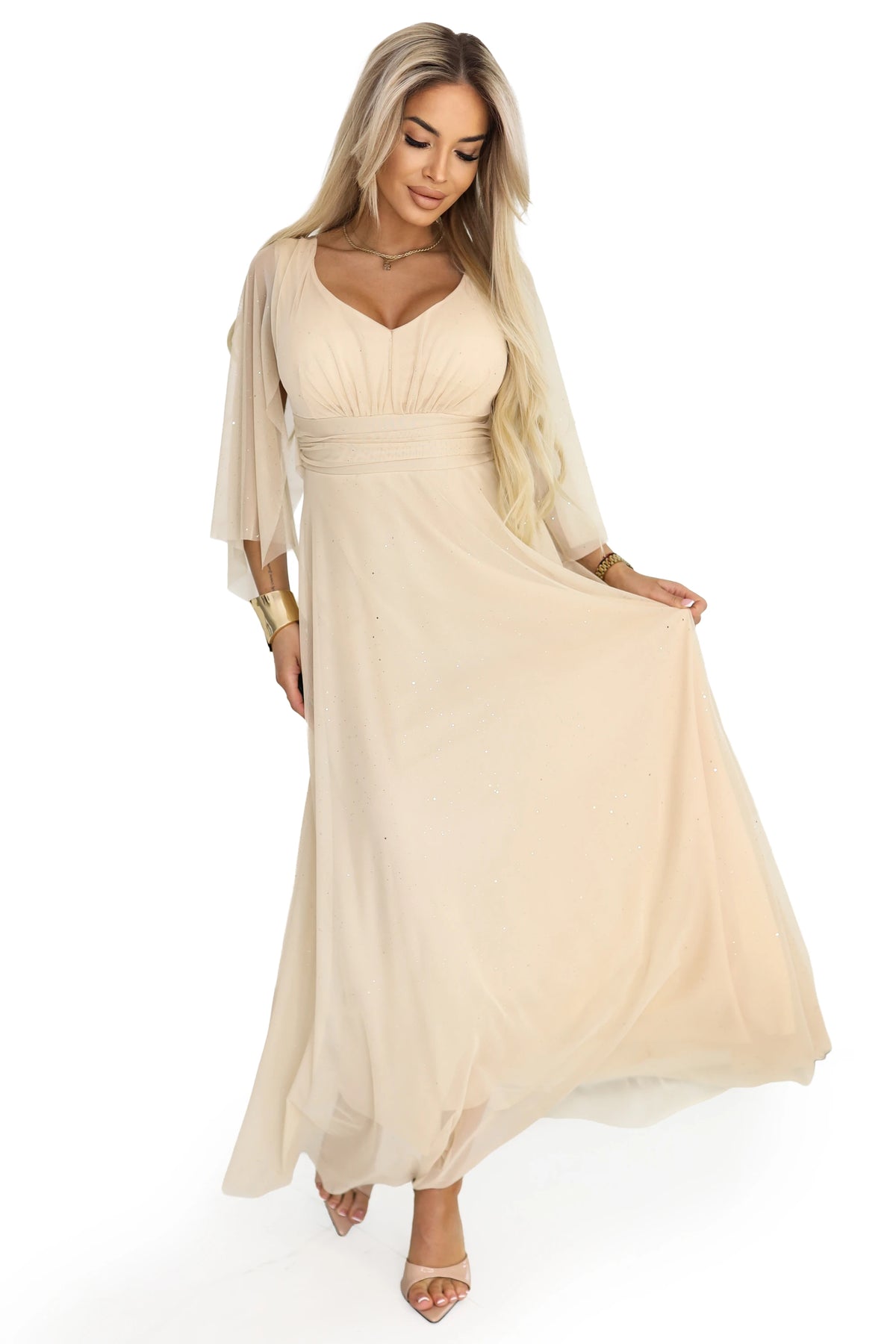 A long, shimmering dress with a plunging neckline and sheer sleeves – Champagne Beige