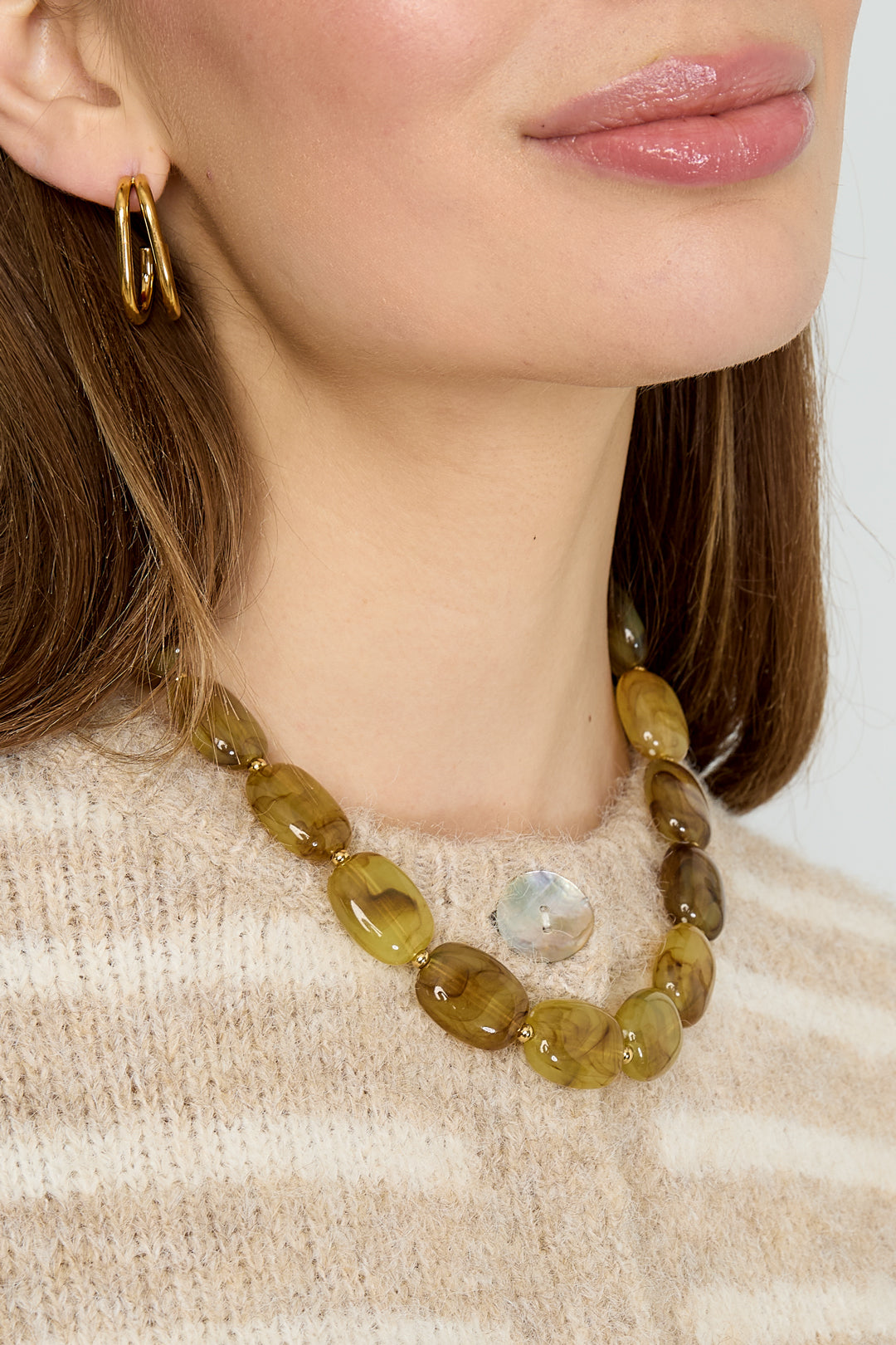 Necklace with squoval beads