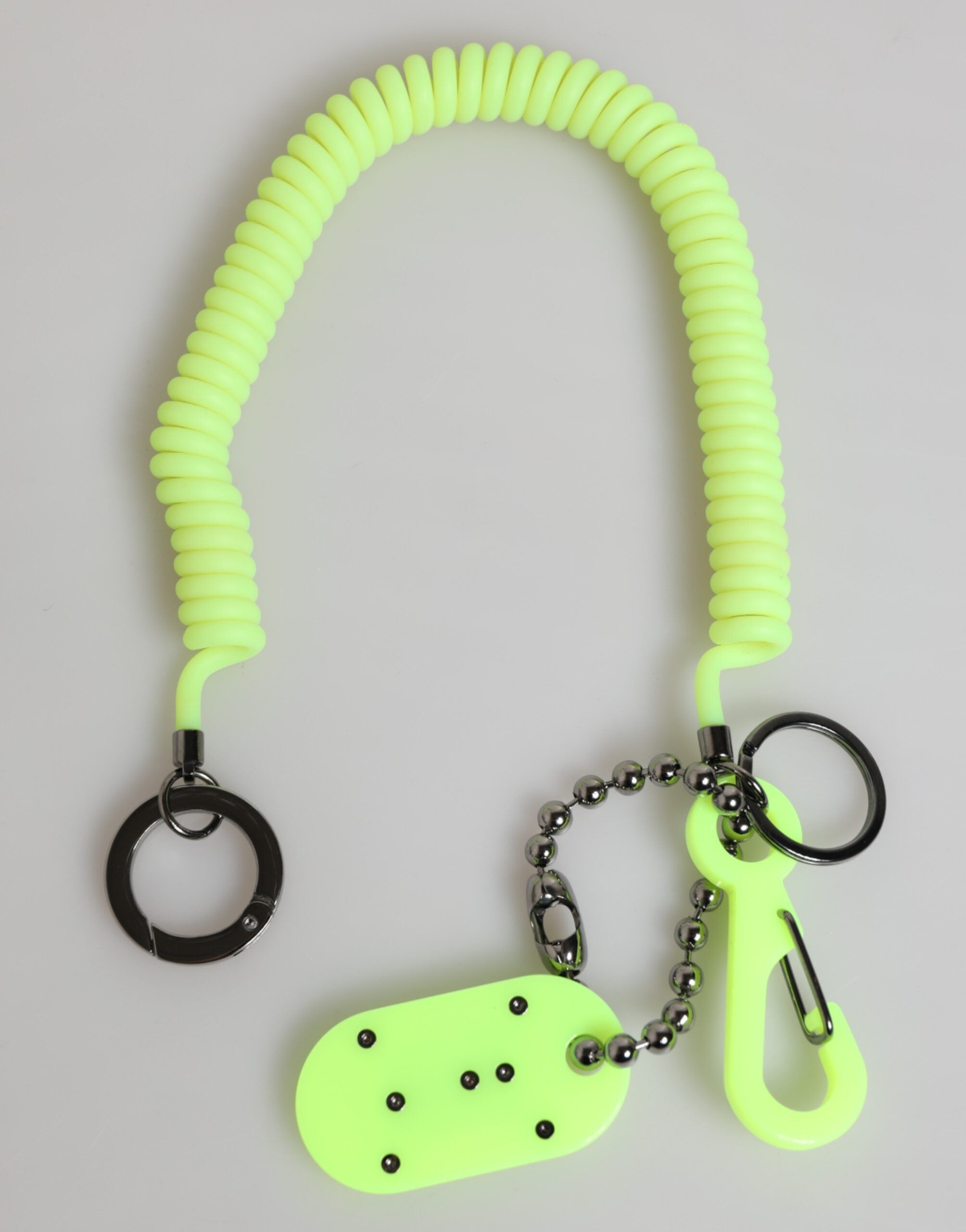 Zelený pružný držák na klíče s logem DG pro muže