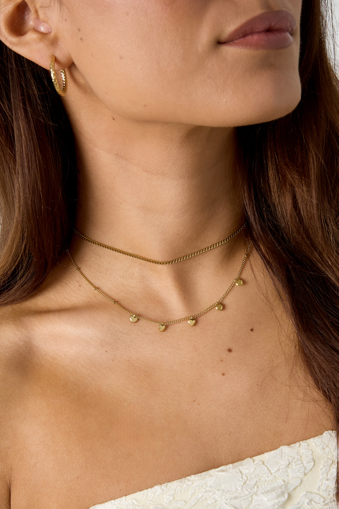 Minimalist necklace with small hearts