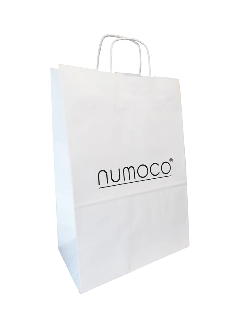 White bag with black logo numoco