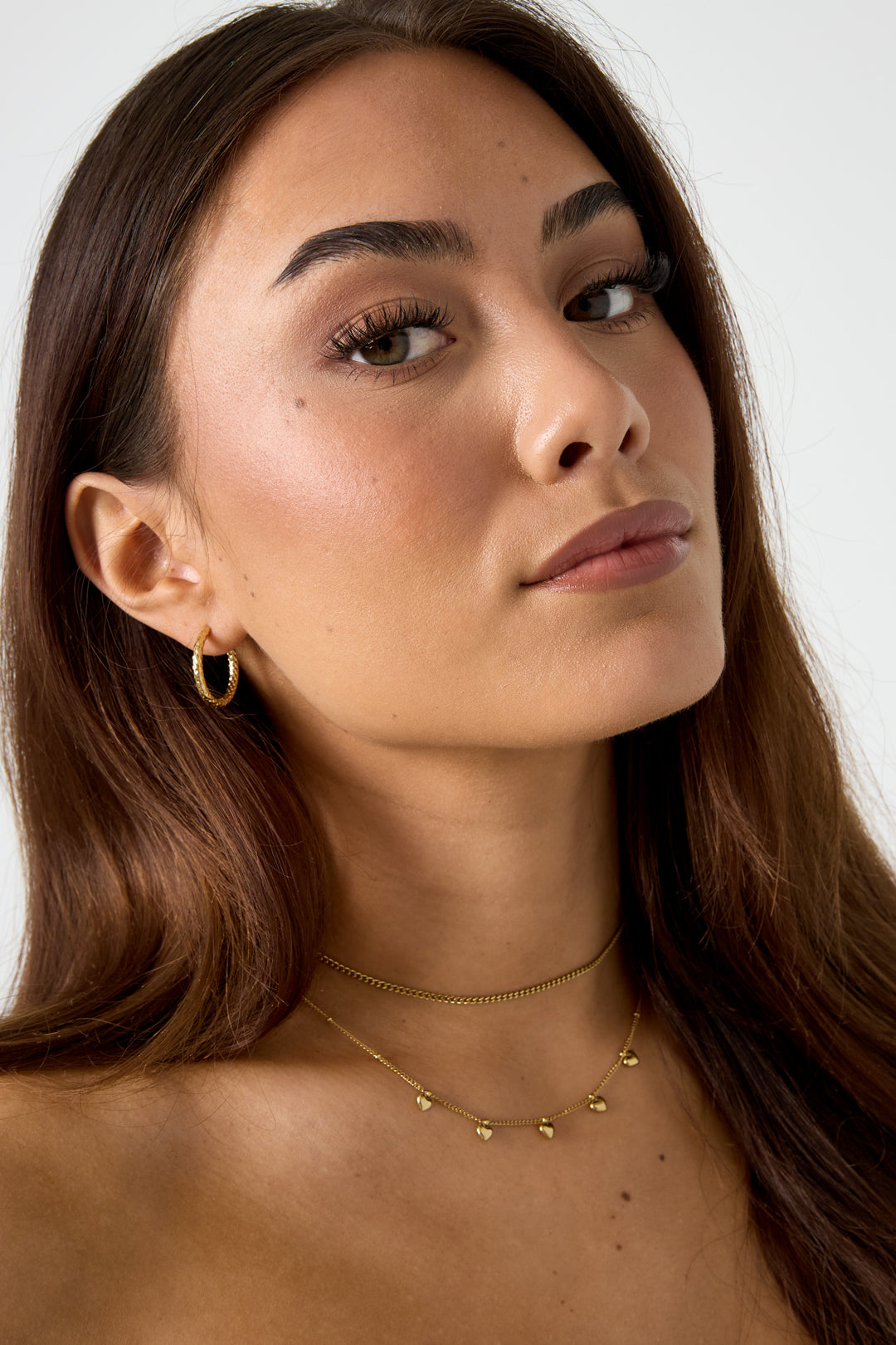 Minimalist necklace with small hearts
