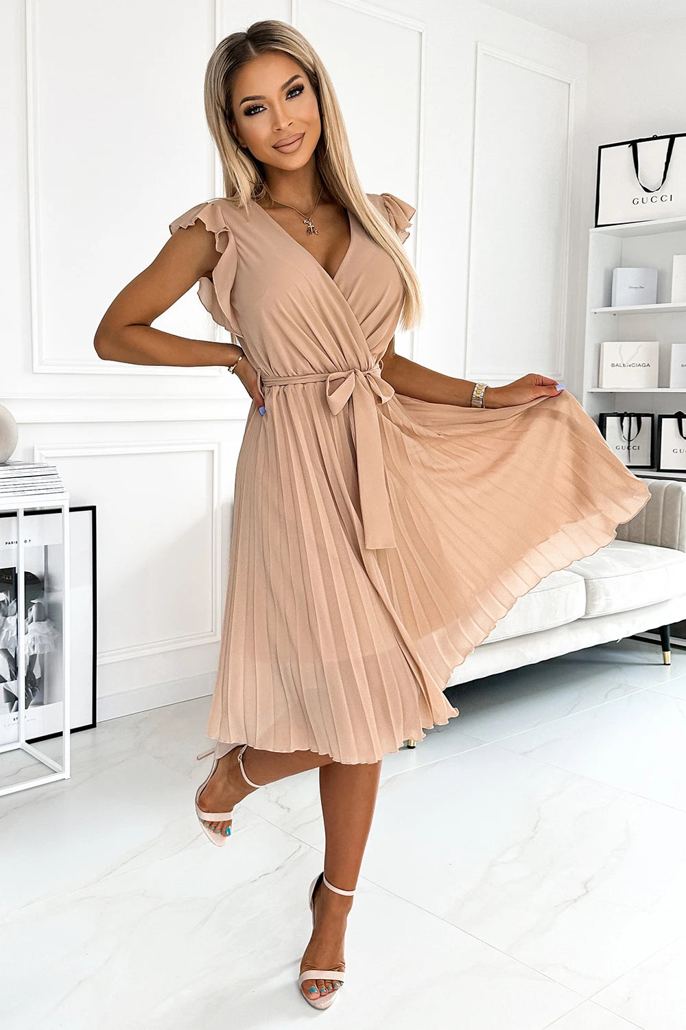 POLINA Pleated dress with a neckline and frills – Beige