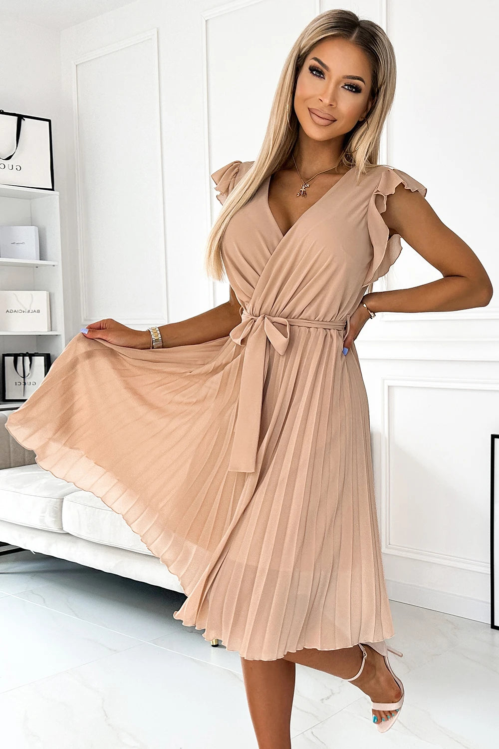 POLINA Pleated dress with a neckline and frills – Beige