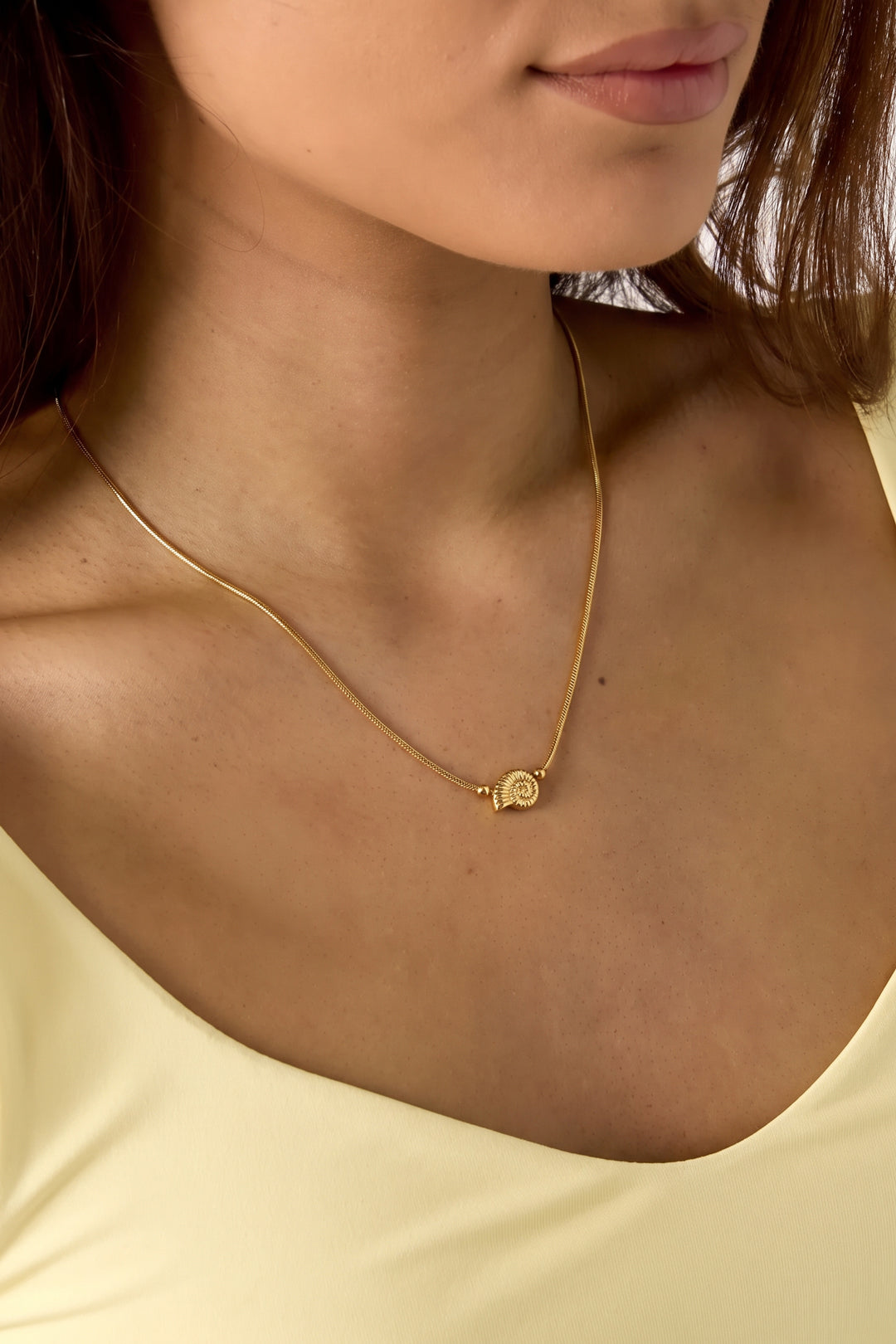 Minimalist necklace with small spiral shell