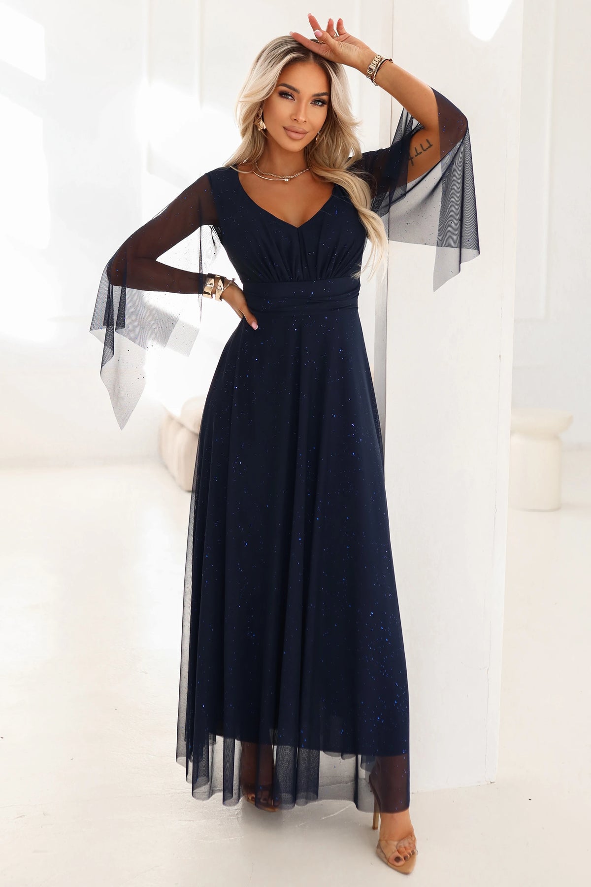 A long, shimmering dress with a neckline and transparent sleeves – Navy Blue