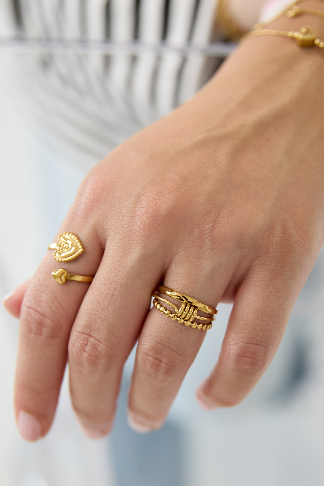 Layered ring with minimalist twisted detail